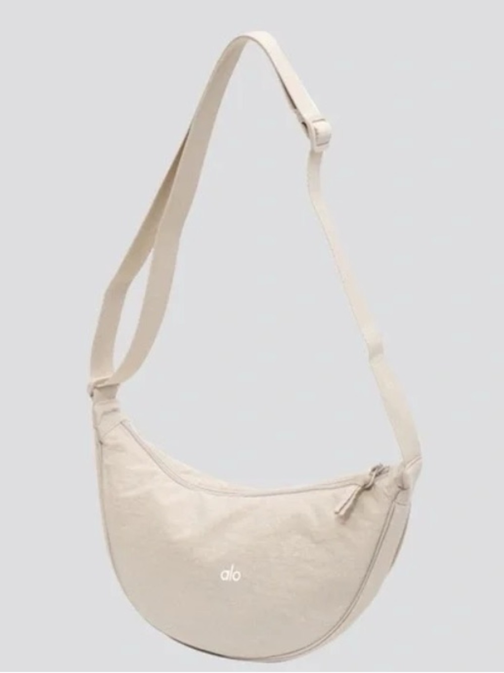 ALO Yoga Crescent Crossbody Bag in Cream